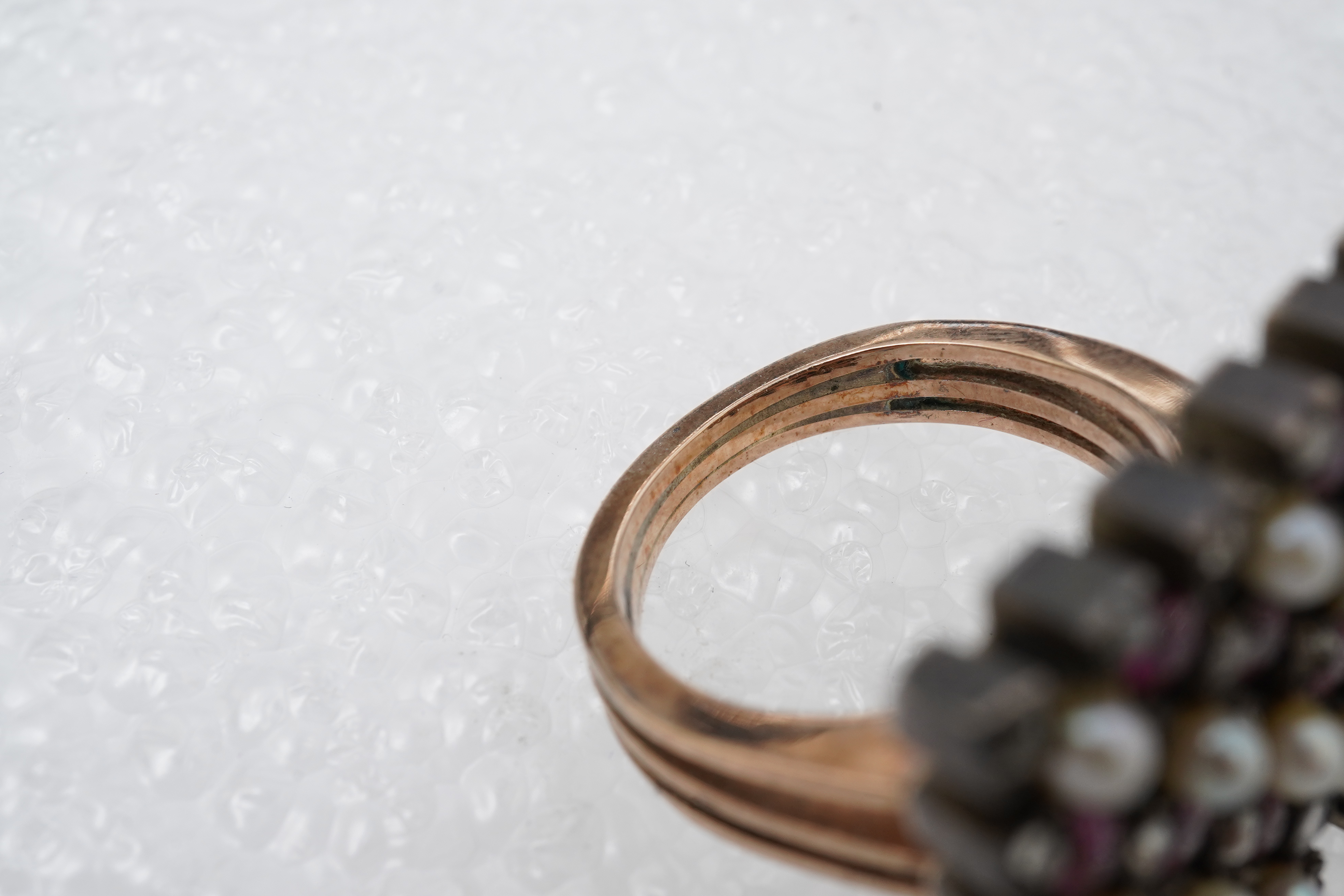 A synthetic ruby, seed pearl and diamond ring